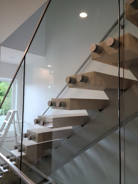 Custom wood and glass stair railing