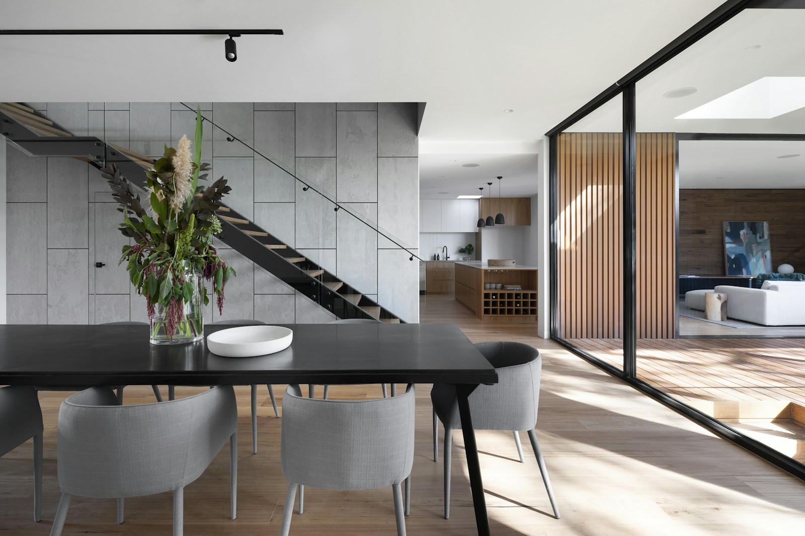 Interior glass and metal railing system on modern staircase